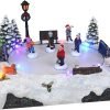 8172rrS72jL._AC_SL1500 Decor Christmas Village Skating Pond Animated Lighted Musical Snow Village Perfect Addition to Your Christmas Indoor Decorations & Holiday Displays